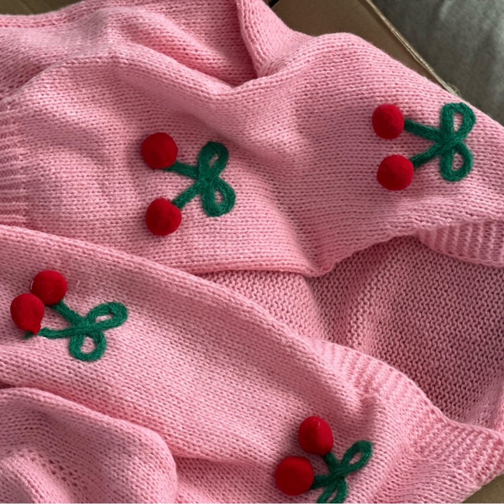 Pink cardigan with cherries